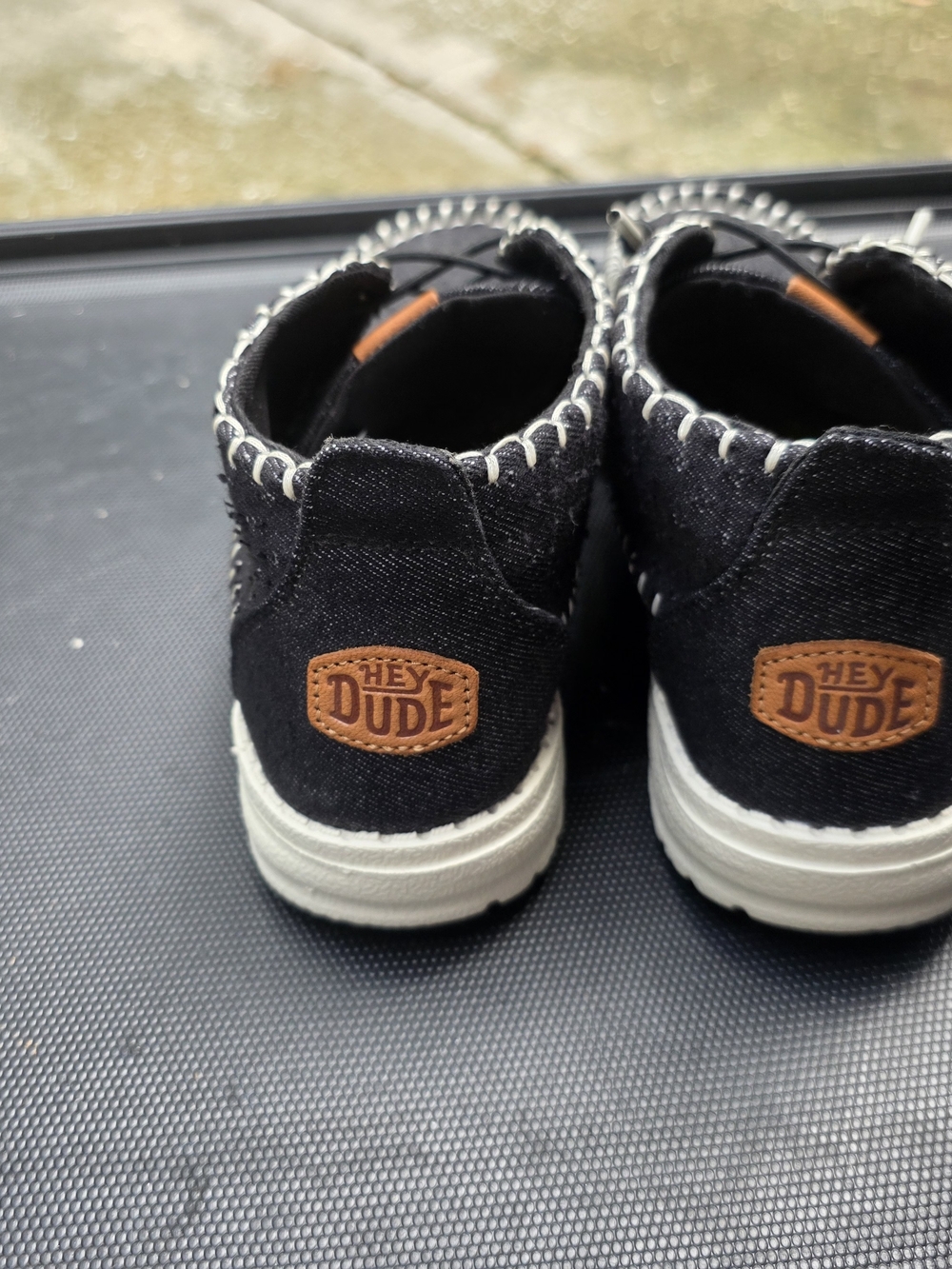 Hey Dude Black and White Slip-On Sneakers